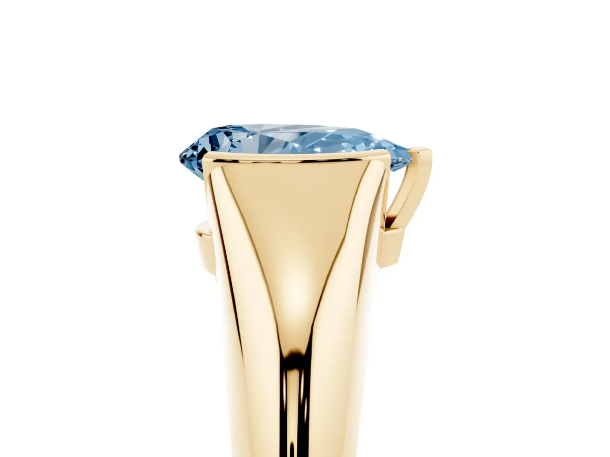 Fancy Blue Pear Cut Solitaire Tension Set Diamond Ring Yellow gold