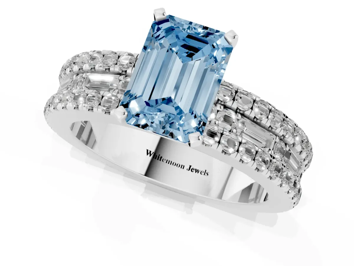 Fancy Blue Emerald Cut Diamond Solitaire Ring with Pavé and Channel Set Band Platinum