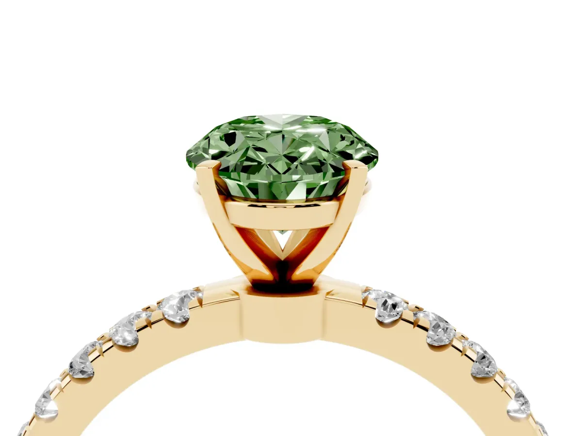Fancy Green Oval Cut Diamond Solitaire Ring with Pavé Accents and Four-Prong Setting Yellow gold