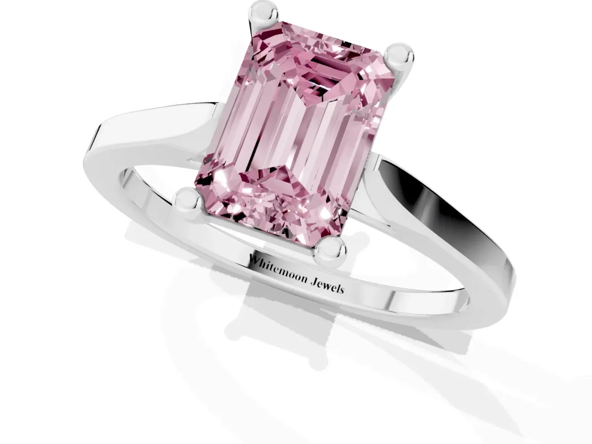 Fancy Pink Emerald Cut Solitaire Diamond Ring with Four-Prong Setting and Tapered Band Platinum