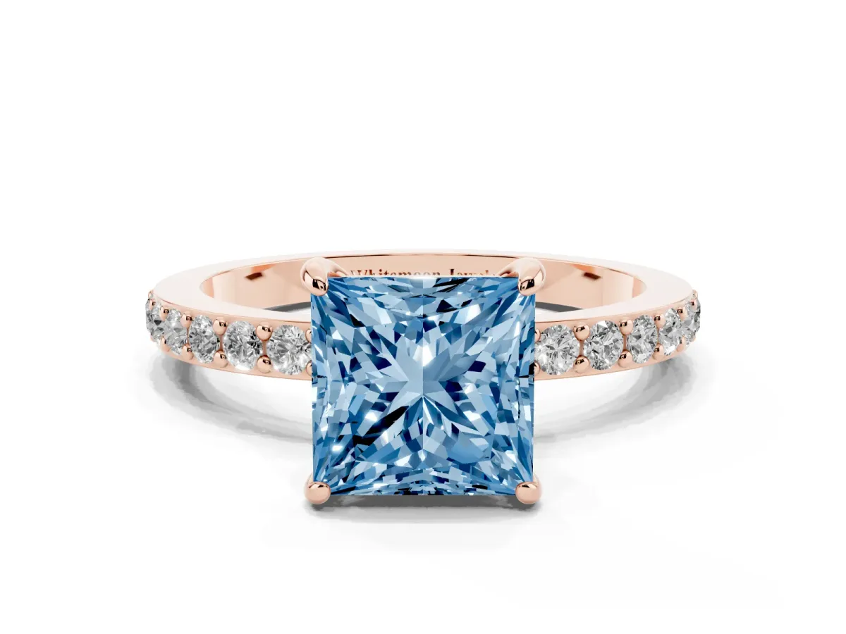 Fancy Blue Princess Cut Diamond Pavé Engagement Ring with Round Accents and Prong Setting Rose gold