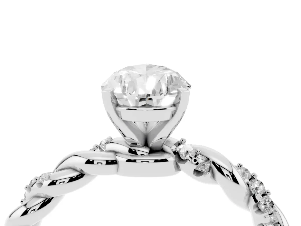 Pear Cut Diamond Solitaire Ring with Twisted Band and Pavé Accents Silver
