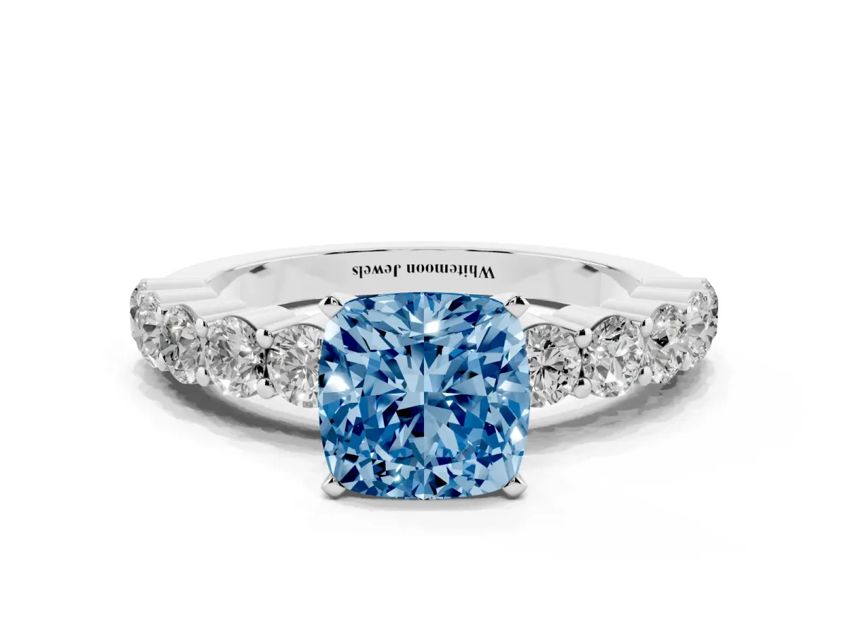 Fancy Blue Cushion Cut Diamond Solitaire Ring with Shared Prong Round Side Stones Platinum