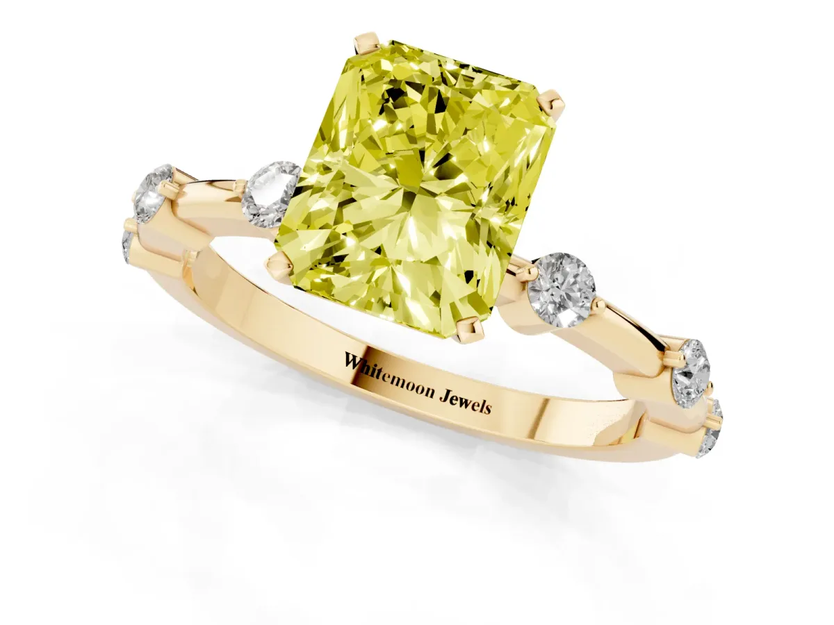 Fancy Yellow Radiant Cut Solitaire Diamond Ring with Bezel Set Side Stones and Prong Setting Yellow gold