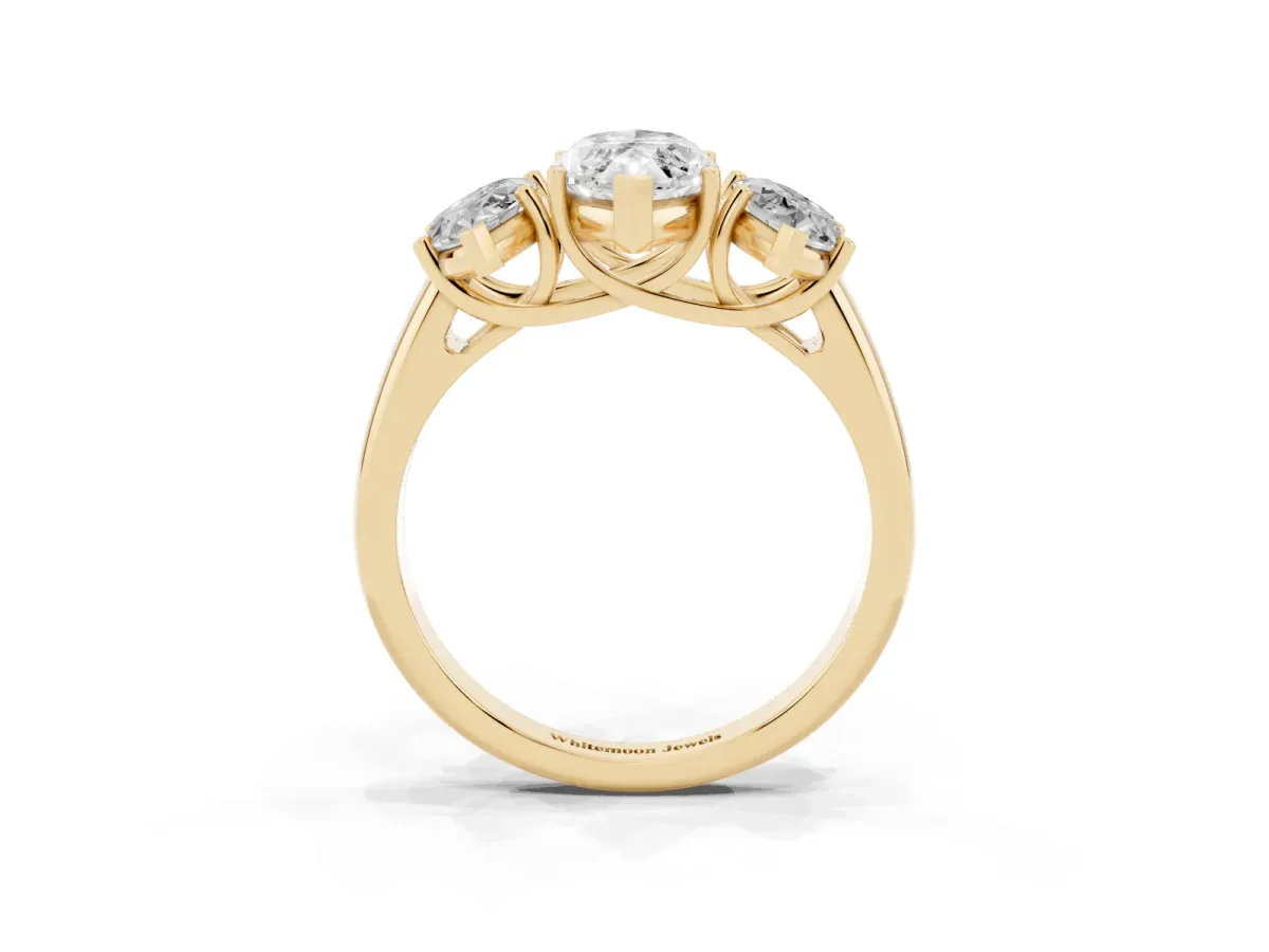 Three-Stone Marquise Cut Diamond Engagement Ring with Prong Setting Yellow gold