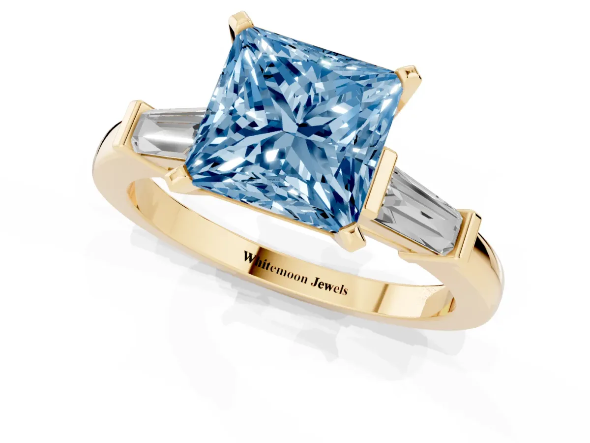 Fancy Blue Princess Cut Cut Diamond Solitaire Ring with Tapered Baguette Accents and Four-Prong Setting Yellow gold
