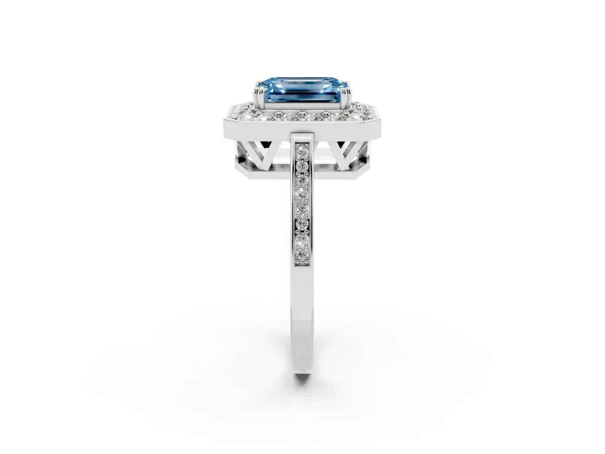 Fancy Blue Emerald Cut Diamond Halo Ring with Split Shank and Four-Prong Setting Silver