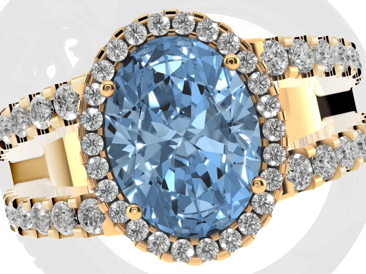 Fancy Blue Oval Cut Cut Halo Split Shank Diamond Ring with Four-Prong Setting Yellow gold
