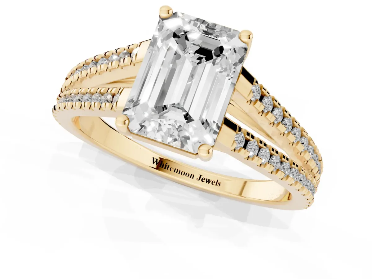 Emerald Cut Diamond Solitaire Engagement Ring with Split Shank Pavé Band Yellow gold