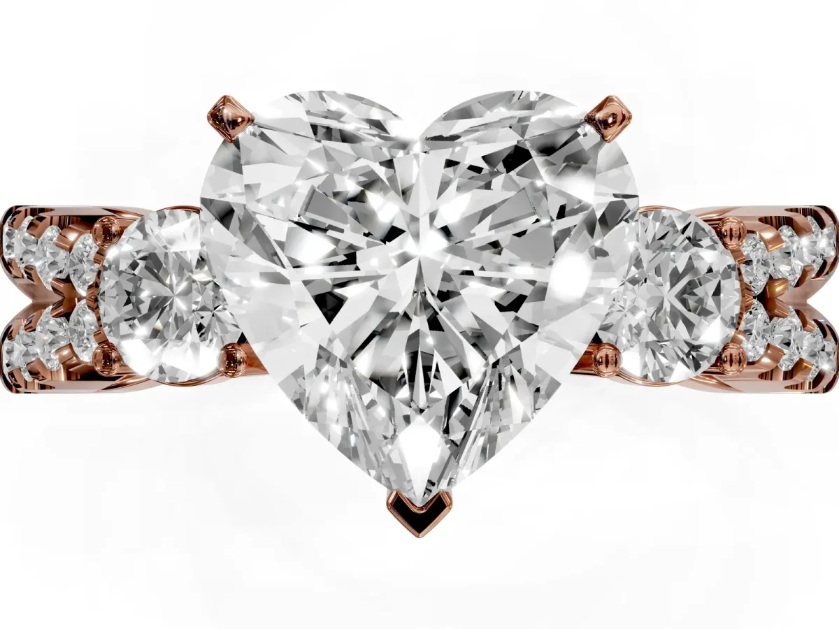 Heart Cut Diamond Three-Stone Ring with Pavé Split Shank and Four-Prong Setting Rose gold