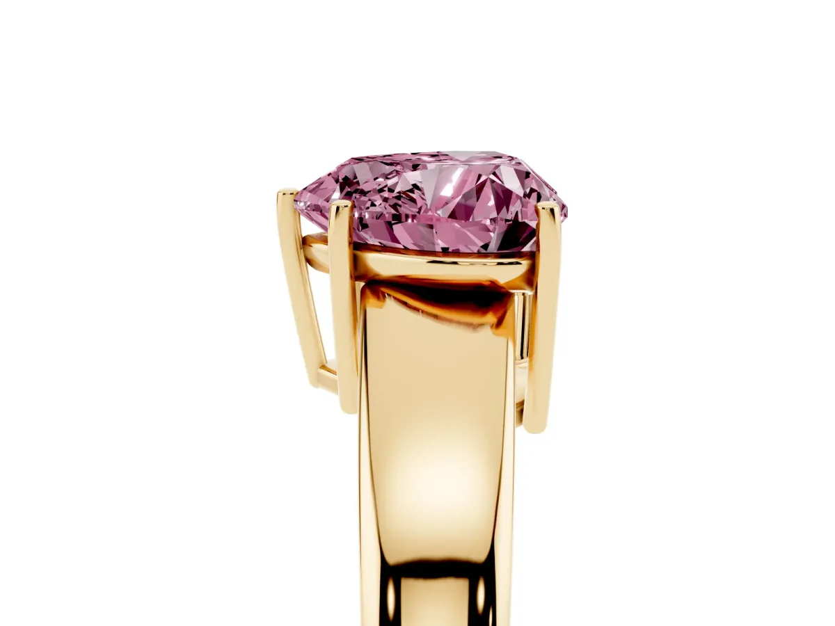 Fancy Pink Heart Cut Solitaire Diamond Ring with Tapered Band and Four-Prong Setting Yellow gold