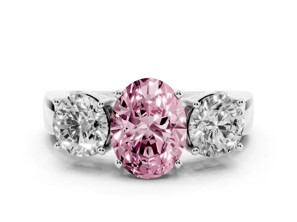 Fancy Pink Three-Stone Oval Cut Diamond Ring with Round Side Stones, Classic Band, and Four-Prong Setting Silver