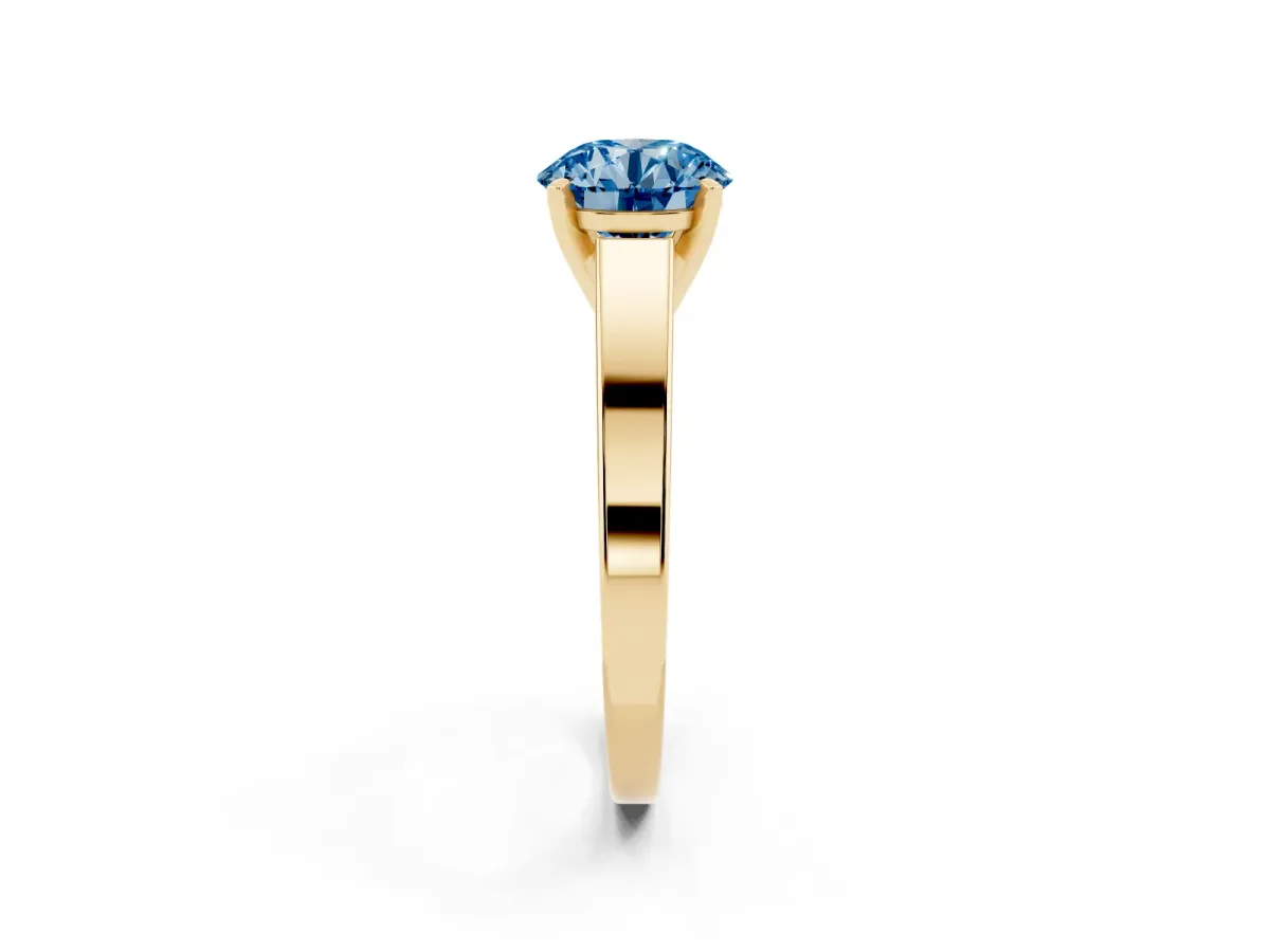 Fancy Blue Round Cut Solitaire Engagement Ring with Four-Prong Setting and Tapered Band Yellow gold