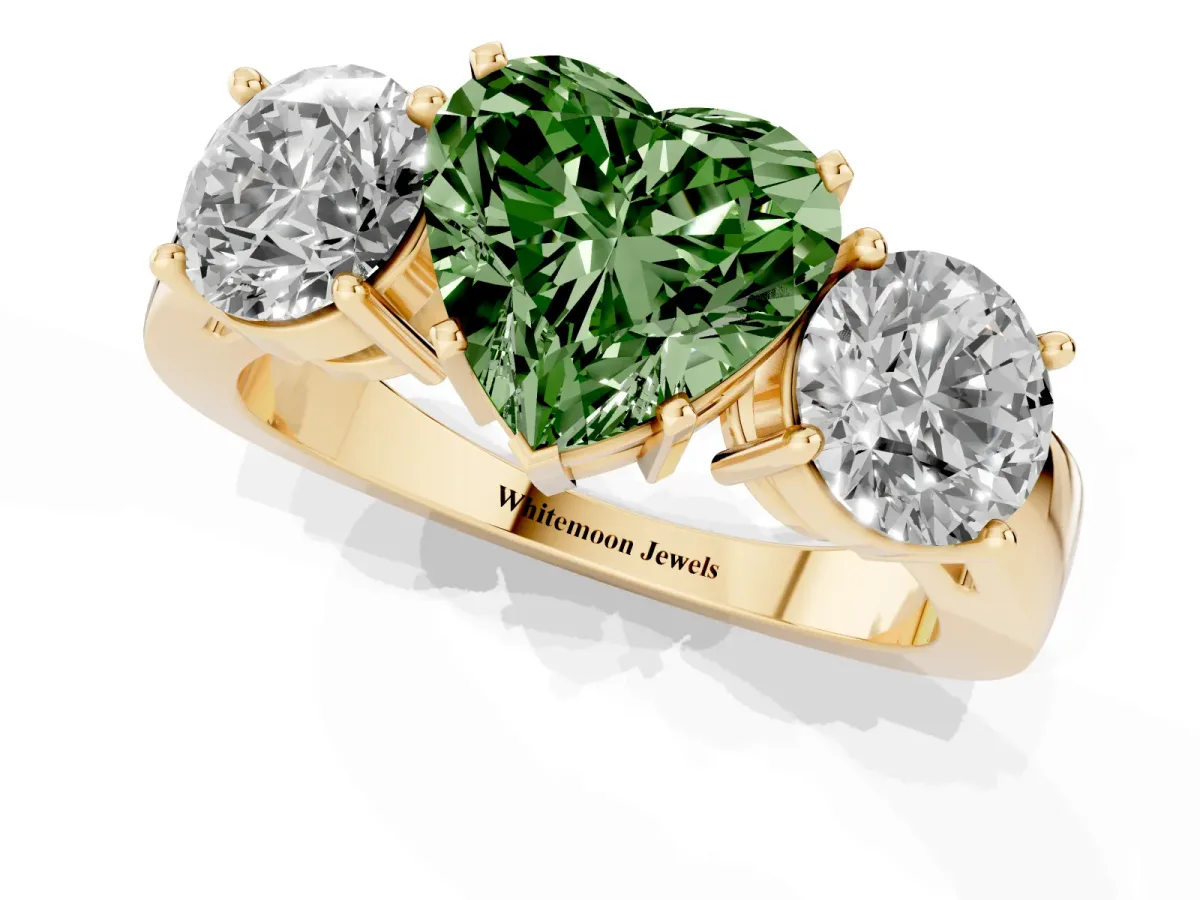 Fancy Green Three-Stone Heart Cut Diamond Ring with Round Side Stones, Classic Band, and Four-Prong Setting Yellow gold