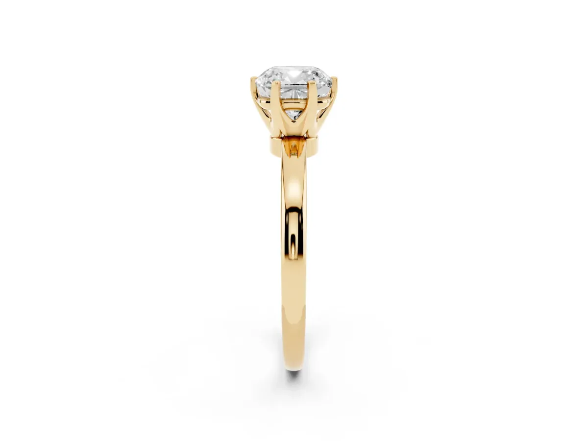 Cushion Cut Solitaire Diamond Ring with Six-Prong Setting on a Classic Band Yellow gold