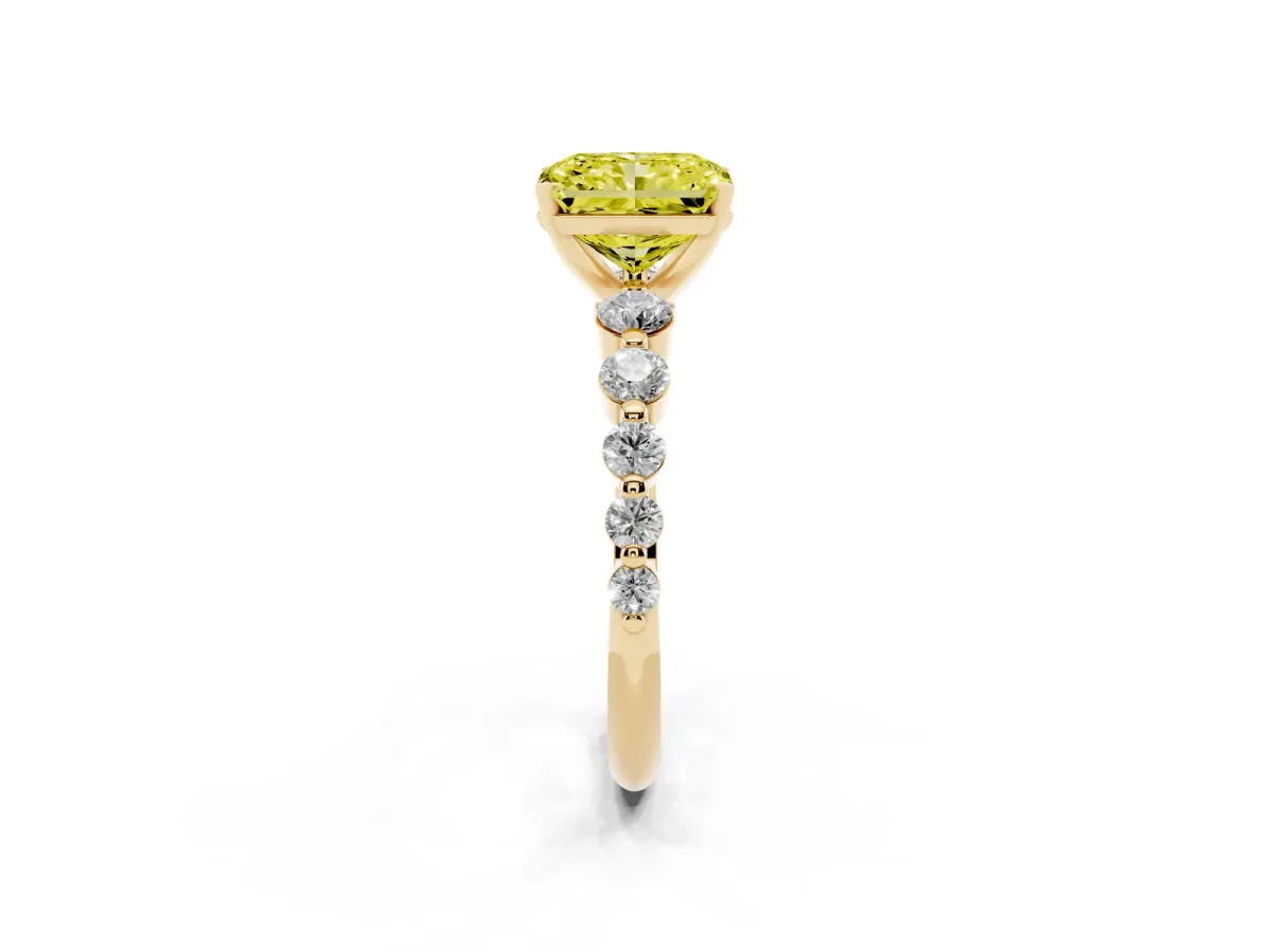 Fancy Yellow Radiant Cut Solitaire Diamond Ring with Pave Band and Four-Prong Setting Yellow gold