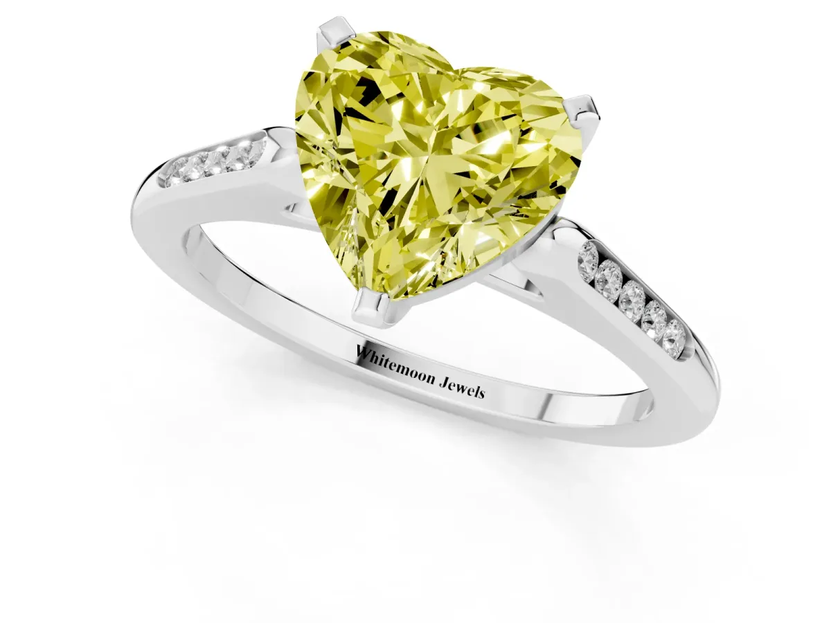 Fancy Yellow Heart Cut Diamond Solitaire Ring with Channel Set Round Band and Prong Setting Silver