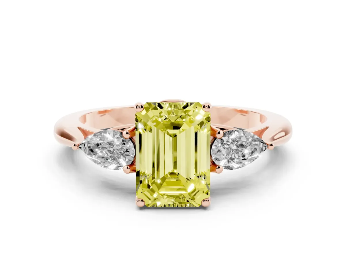 Fancy Yellow Three-Stone Emerald Cut Diamond Ring with Pear Side Stones in Four-Prong Setting Rose gold