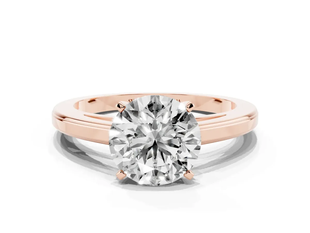 Round Cut Solitaire Diamond Ring with Four-Prong Setting and Classic Band Rose gold
