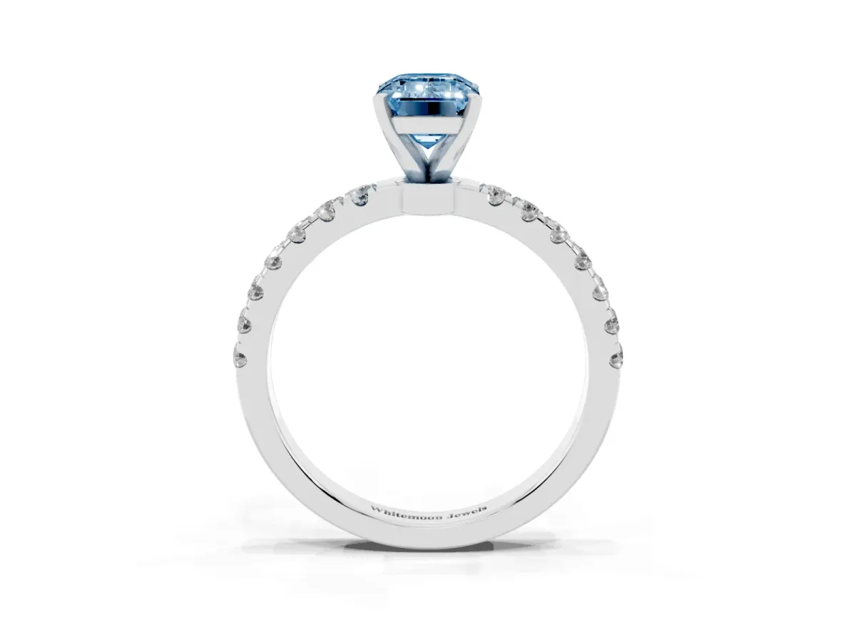Fancy Blue Emerald Cut Diamond Solitaire Ring with Pavé Accents and Four-Prong Setting Platinum