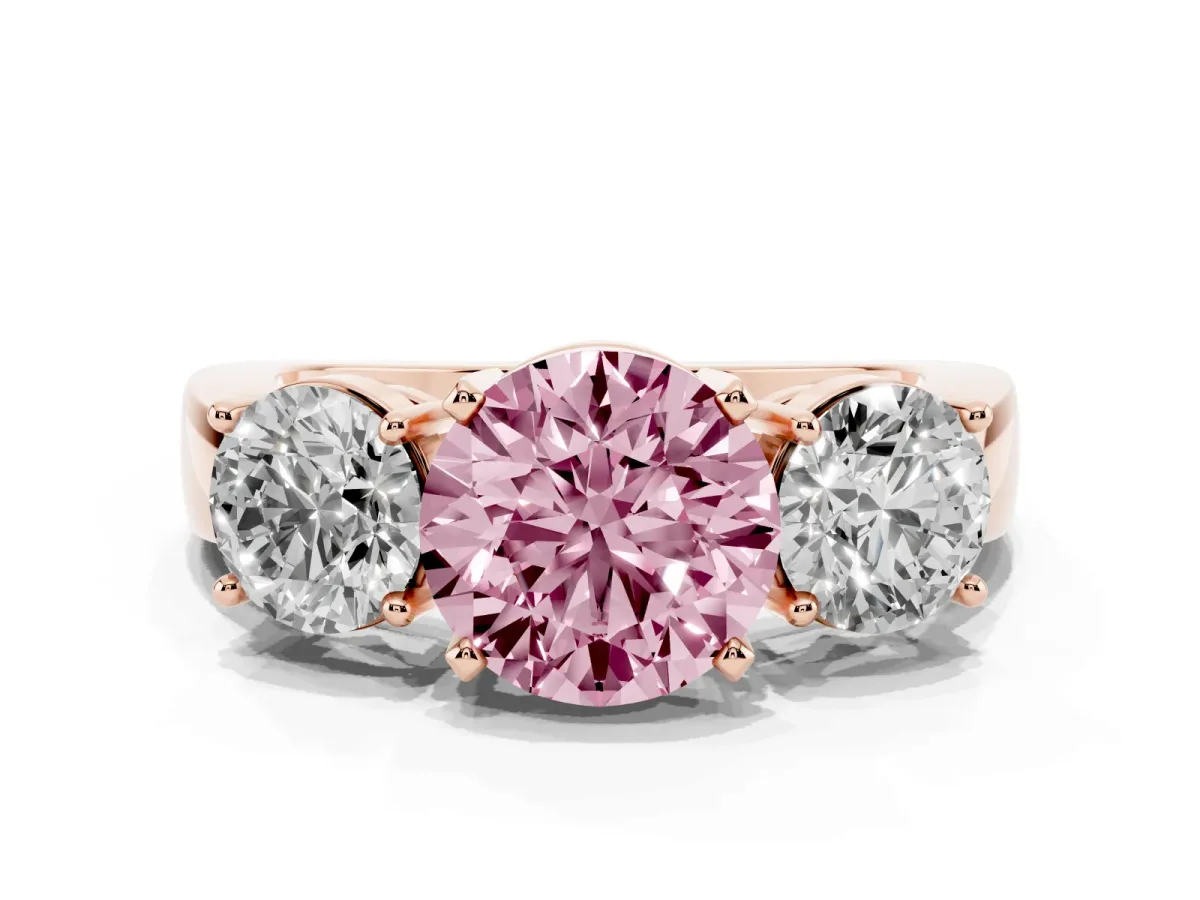 Fancy Pink Three-Stone Round Cut Diamond Ring with Round Side Stones, Classic Band, and Four-Prong Setting Rose gold