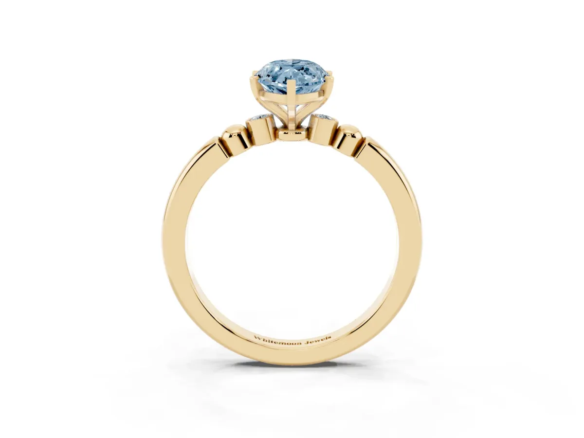 Fancy Blue Marquise Cut Solitaire Beaded Band with Four-Prong Setting Yellow gold