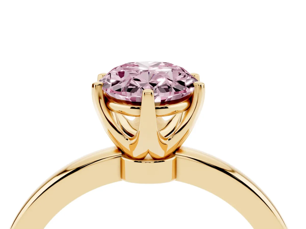Fancy Pink Oval Cut Solitaire Diamond Ring with Six-Prong Setting on a Classic Band Yellow gold
