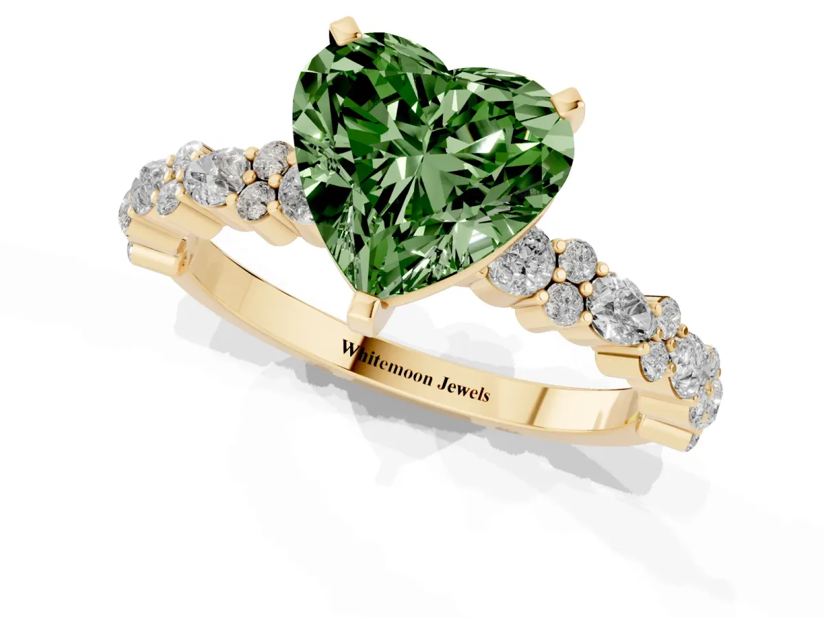 Fancy Green Heart Cut Diamond Side Stone Solitaire Ring with Round and Four-Prong Setting Yellow gold