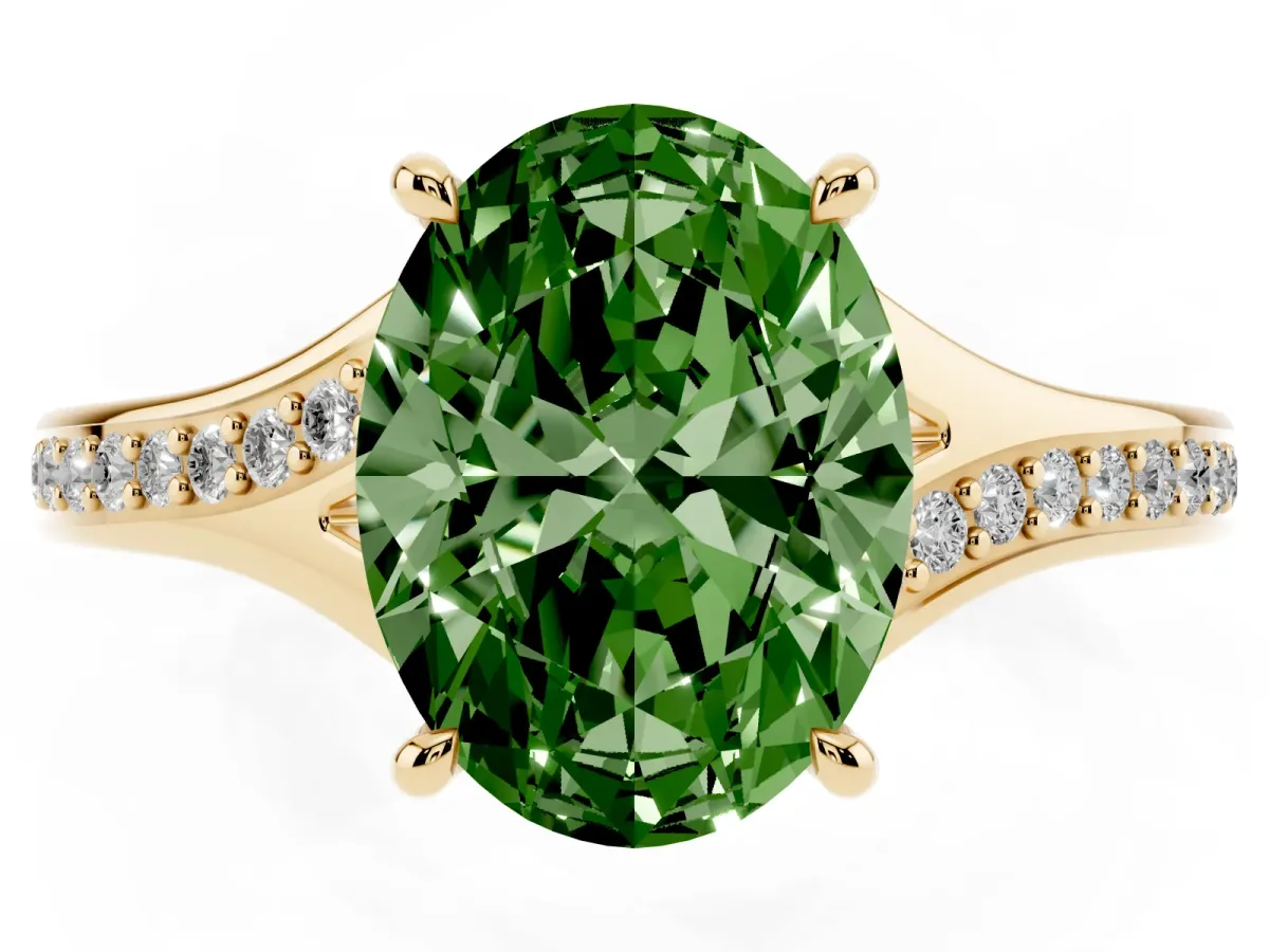 Fancy Green Oval Cut Diamond Solitaire Ring with Pavé Band and Prong Setting Yellow gold