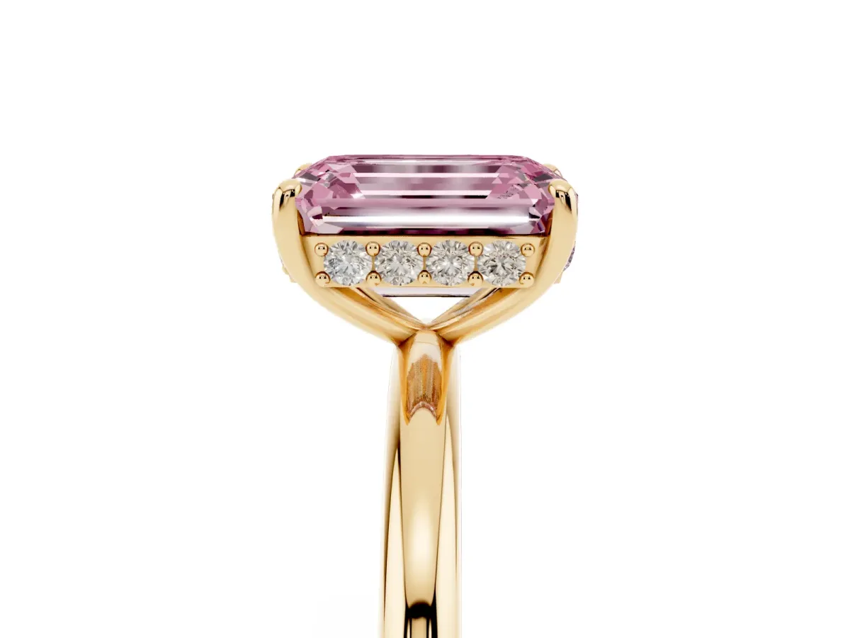 Fancy Pink Emerald Cut Solitaire Diamond Ring with a Classic Band and Four-Prong Setting Yellow gold