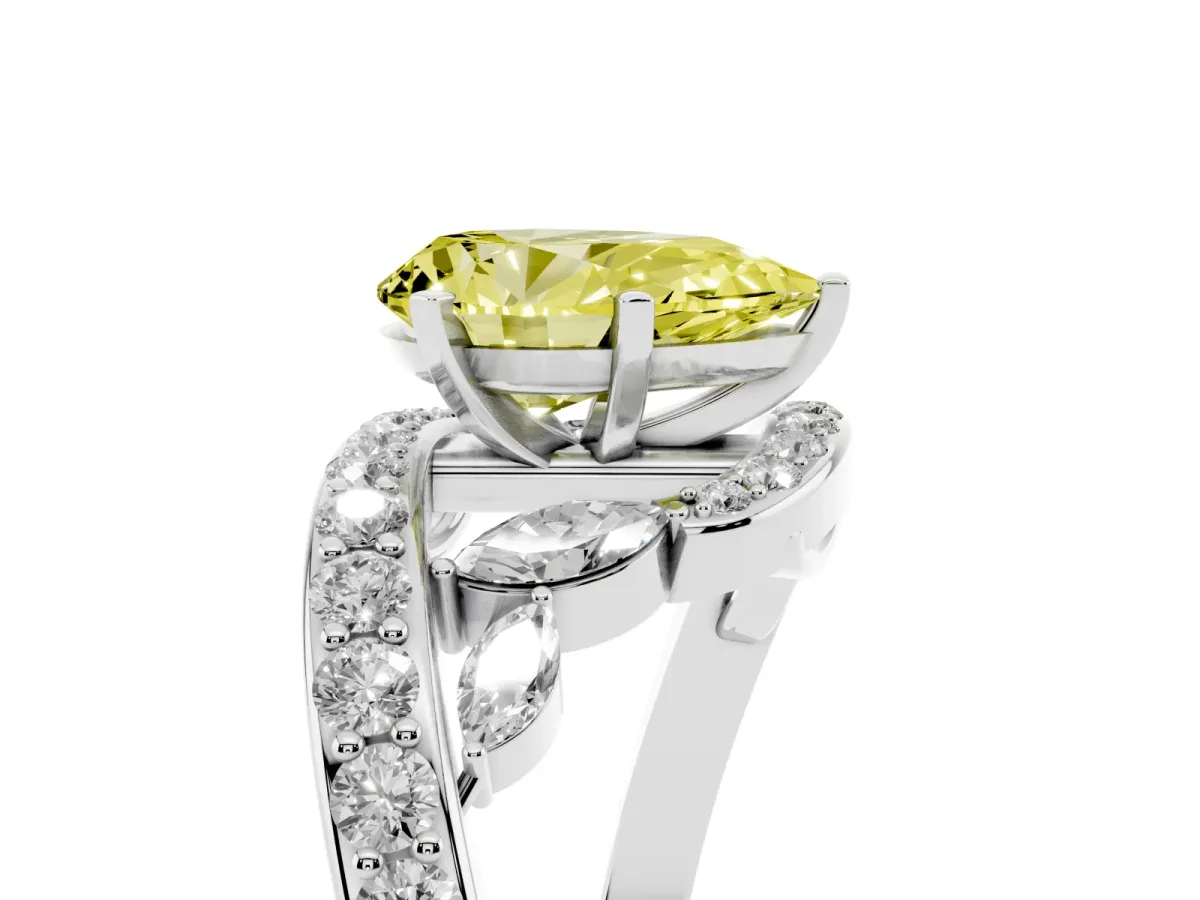Fancy Yellow Pear Cut Solitaire with Pavé Twist Band and Four-Prong Setting Silver