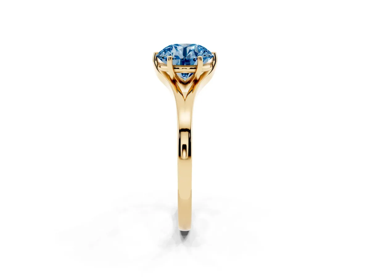 Fancy Blue Round Cut Solitaire Diamond Ring with Six-Prong Setting and Tapered Band Yellow gold