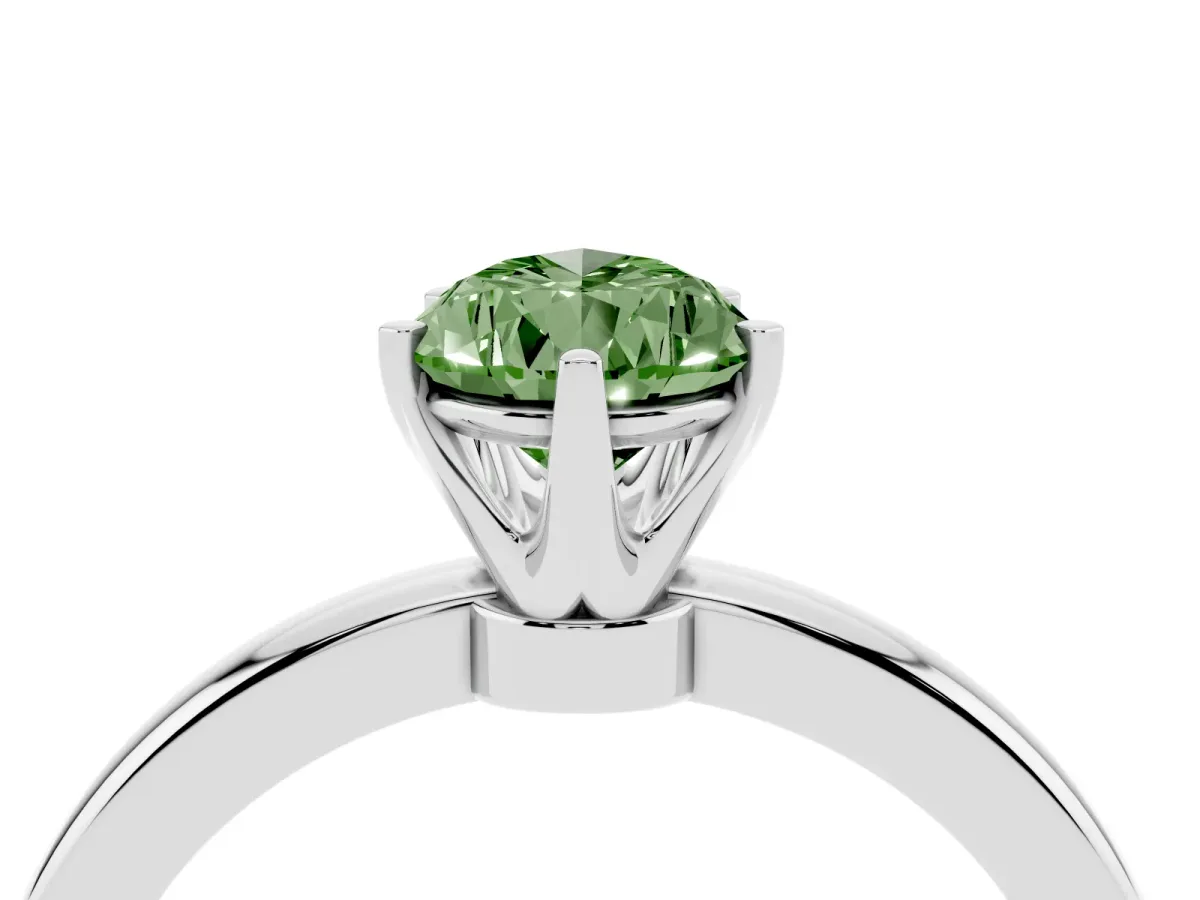 Fancy Green Pear Cut Solitaire Diamond Ring with Six-Prong Setting on a Classic Band Silver