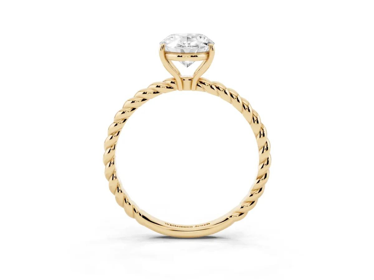 Oval Cut Solitaire Twist Band Ring with Four-Prong Setting Yellow gold