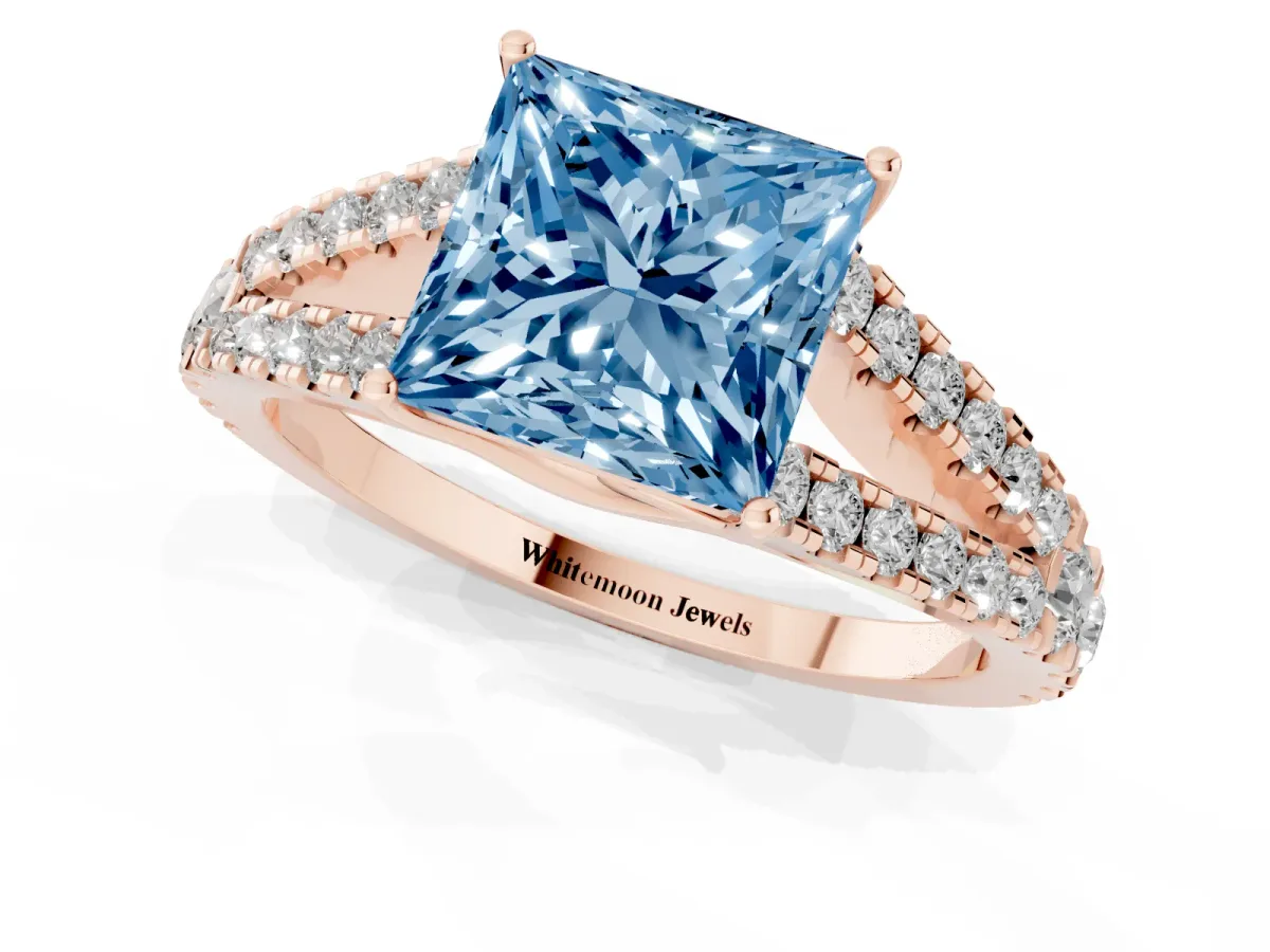 Fancy Blue Princess Cut Diamond Split Shank Engagement Ring with Round Pavé and Prong Setting Rose gold