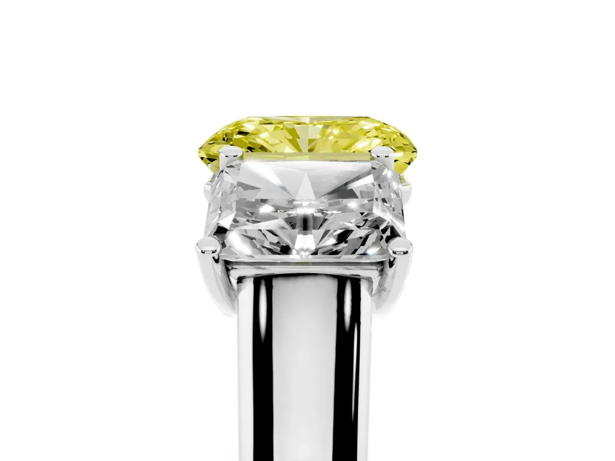 Fancy Yellow Radiant Cut Three-Stone Diamond Ring with Prong Setting on a Classic Band Silver