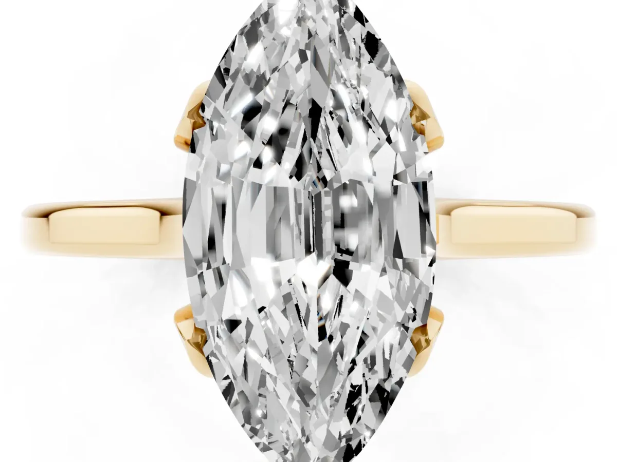 Marquise Cut Diamond Solitaire Ring with Flower Prong Setting and Classic Band Yellow gold