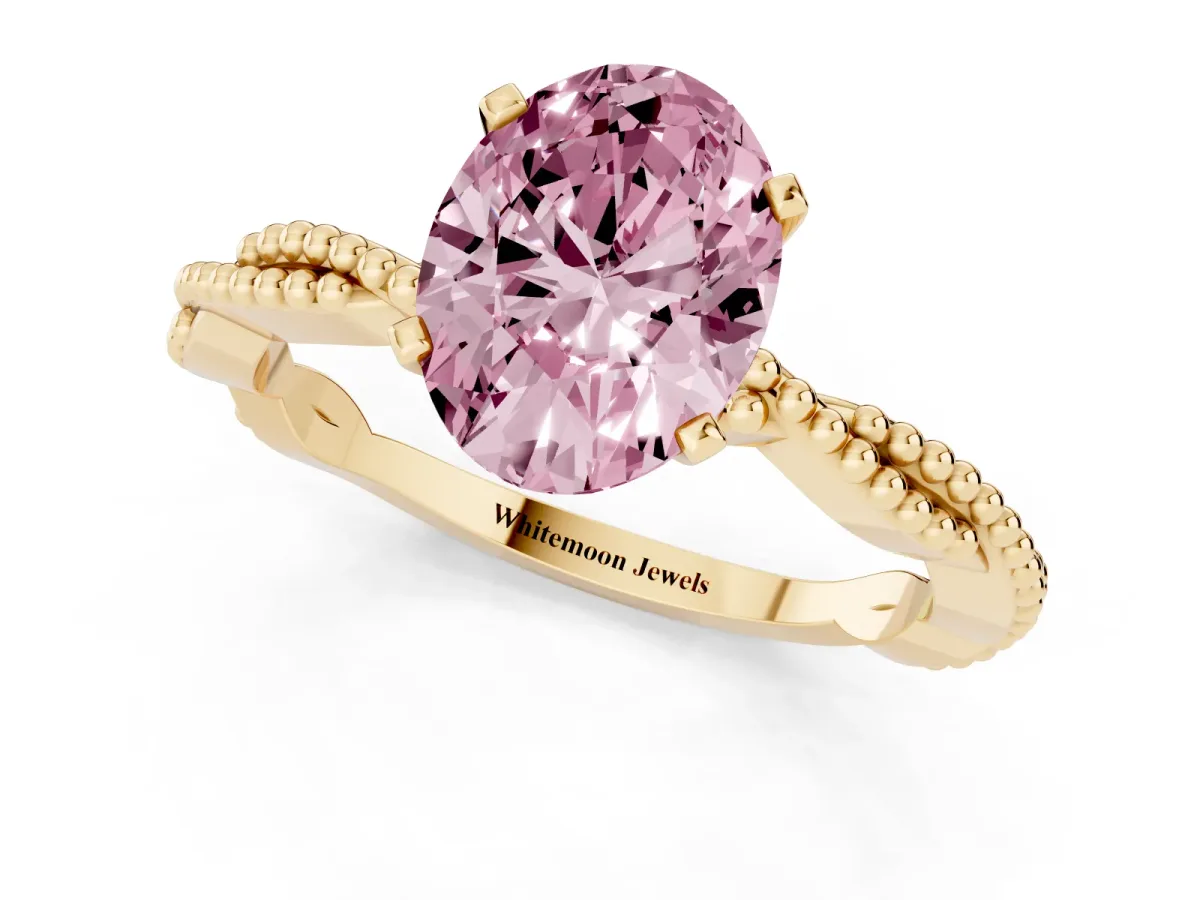 Fancy Pink Oval Cut Solitaire Twisted Band with Bead Prong Setting Yellow gold