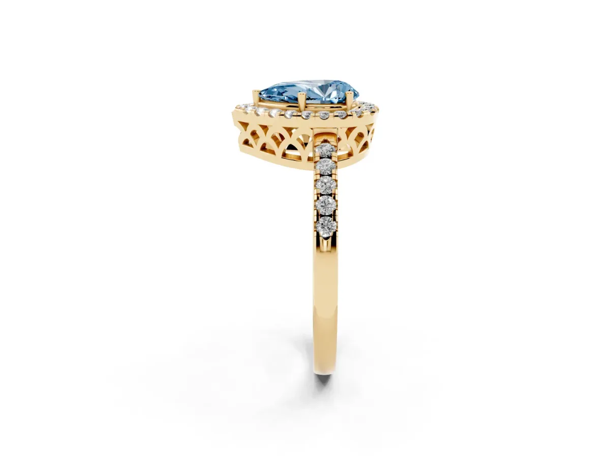 Fancy Blue Pear Cut Halo Diamond Engagement Ring with Pavé Band and Four-Prong Setting Yellow gold