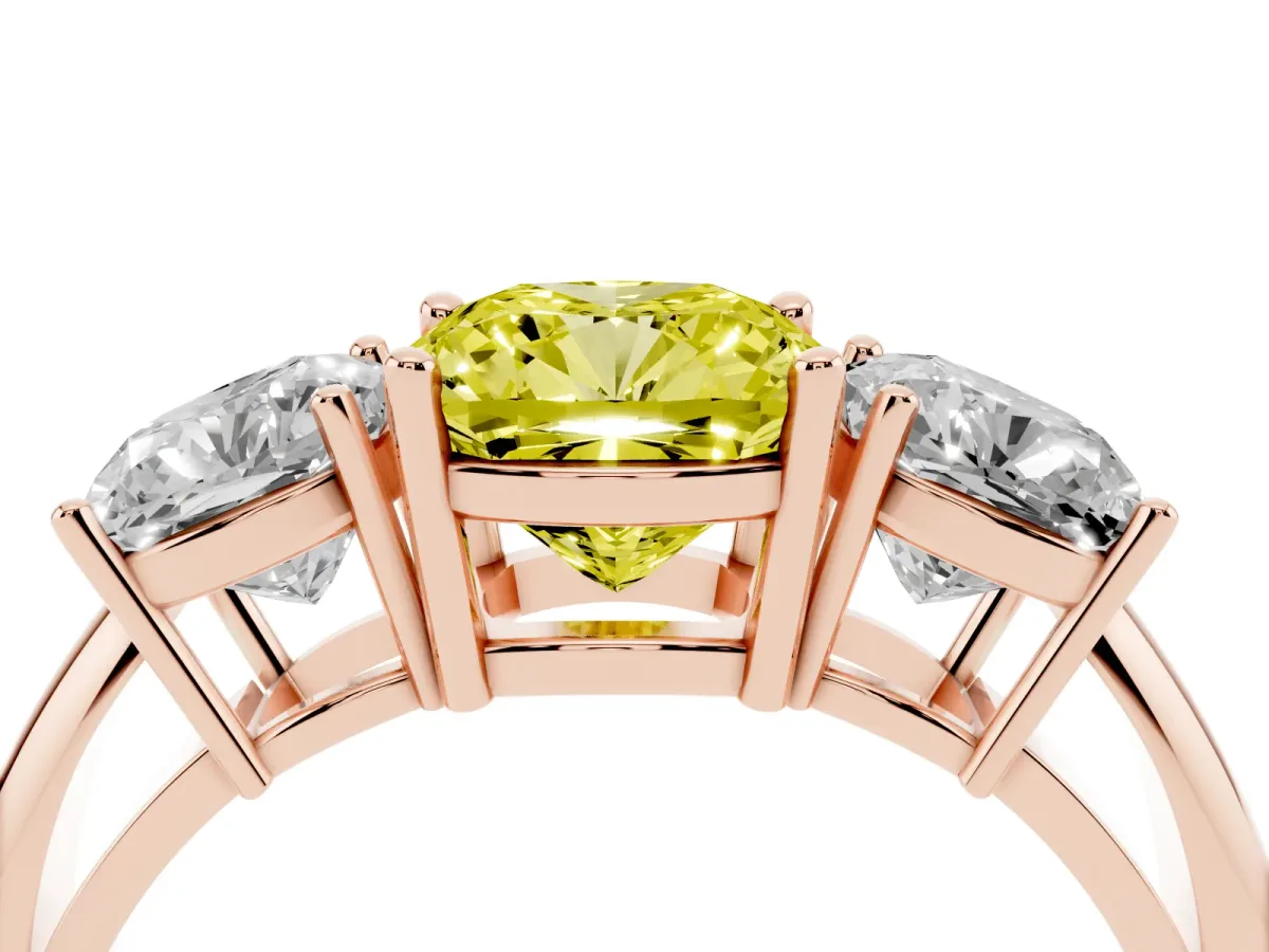 Fancy Yellow Three-Stone Cushion Cut Cut Diamond Engagement Ring with Prong Setting on a White Gold Band Rose gold