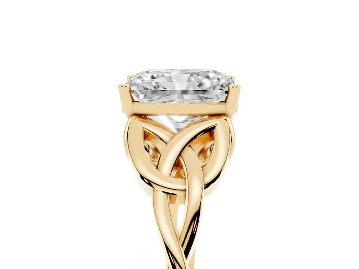 Radiant Cut Diamond Solitaire Engagement Ring with Celtic Knot Band and Four-Prong Setting Yellow gold