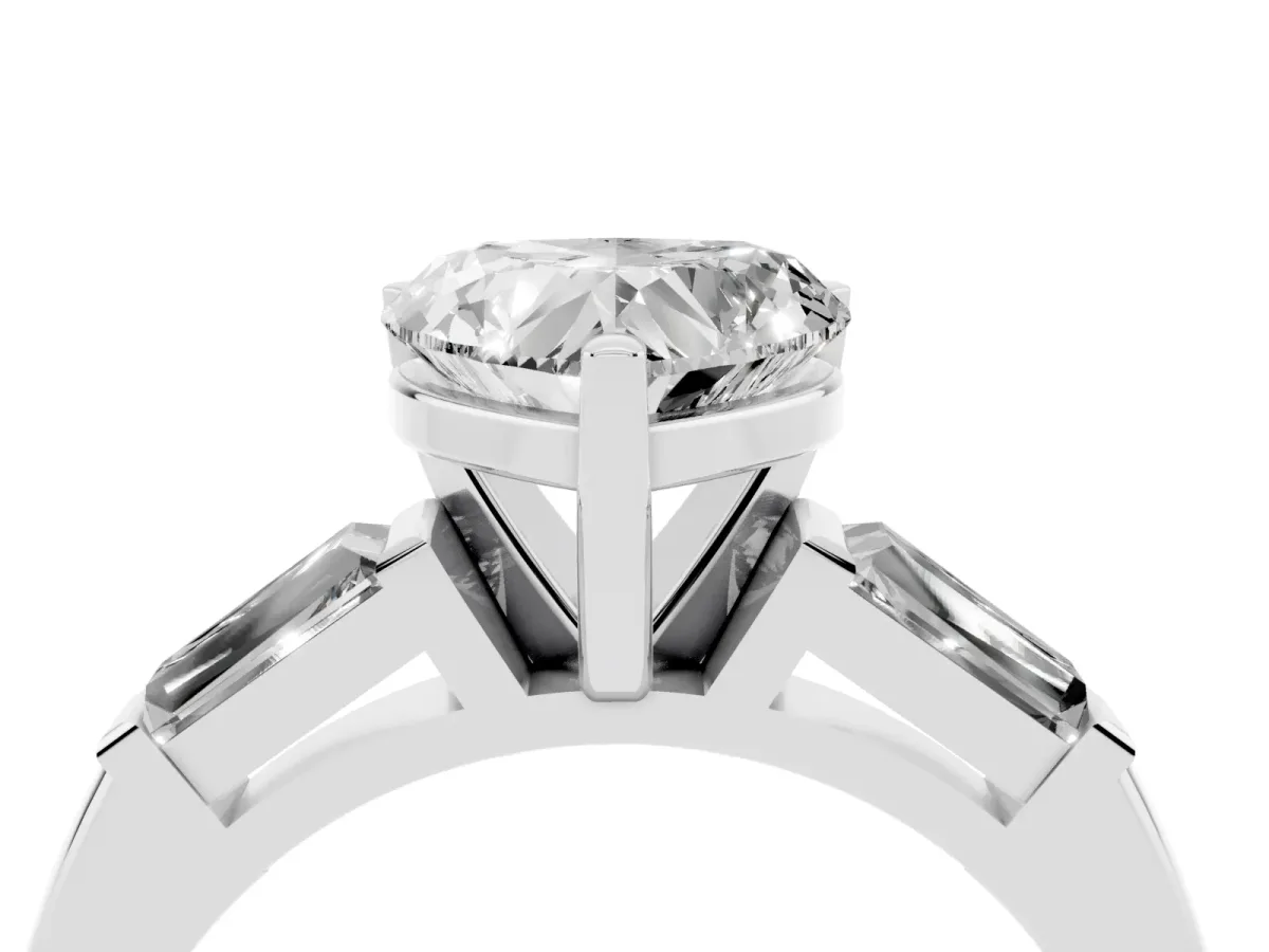 Heart Cut Solitaire with Tapered Baguette Side Stones on a Classic Band with Four-Prong Setting Silver