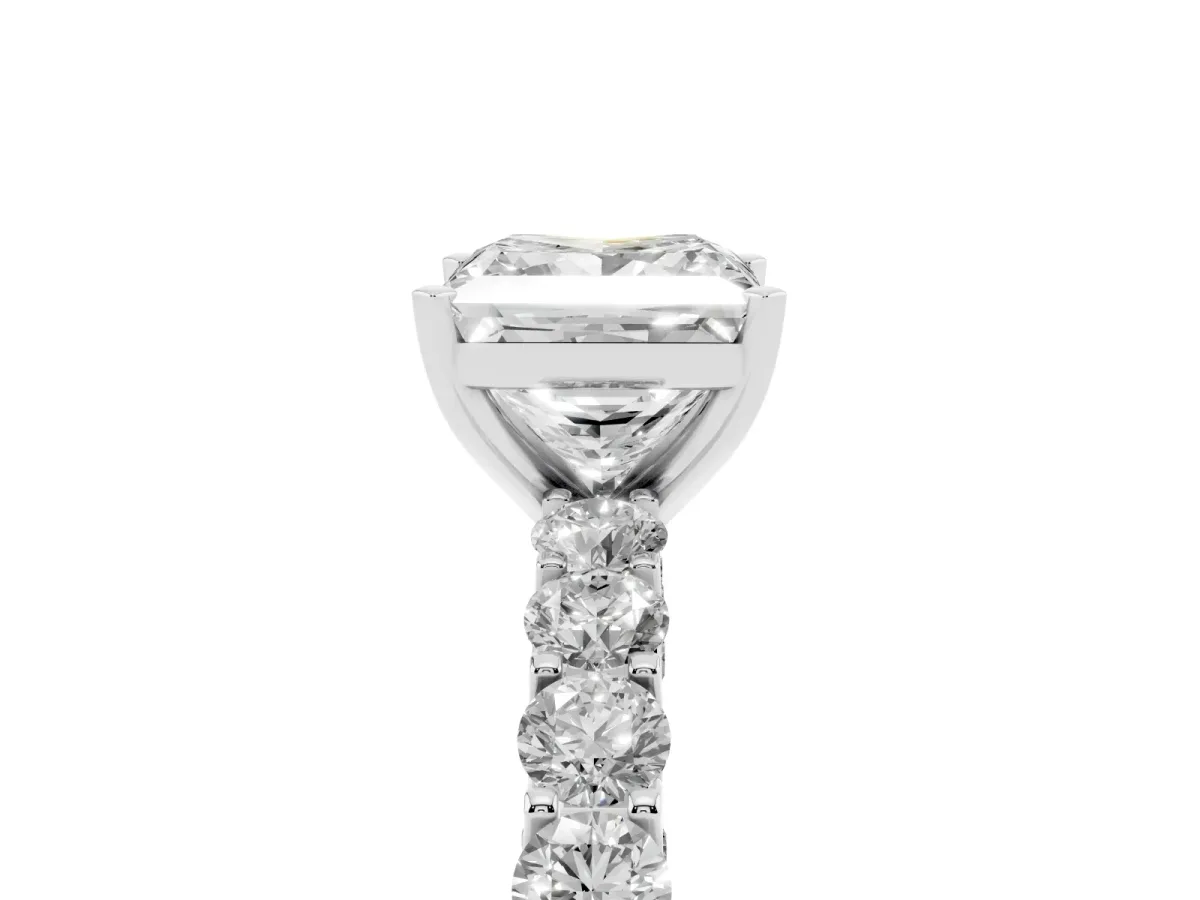 Princess Cut Diamond Solitaire Ring with Shared Prong Pavé Band and Four-Prong Setting Platinum