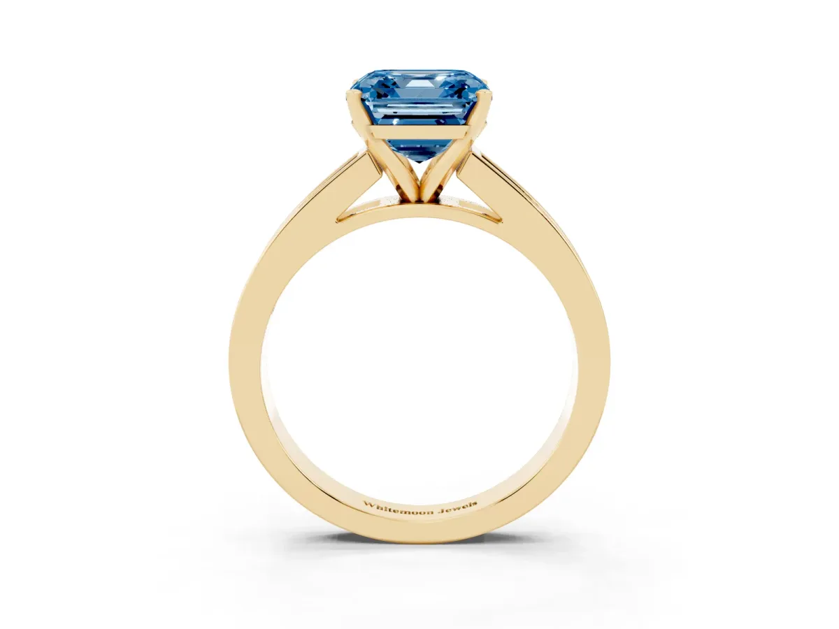 Fancy Blue Asscher Cut Solitaire Diamond Ring with Channel-Set Band and Four-Prong Setting Yellow gold