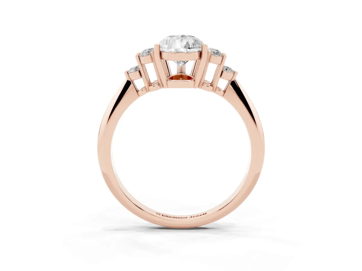 Pear Cut Cut Diamond Cluster Ring with Solitaire Band and Four-Prong Setting Rose gold