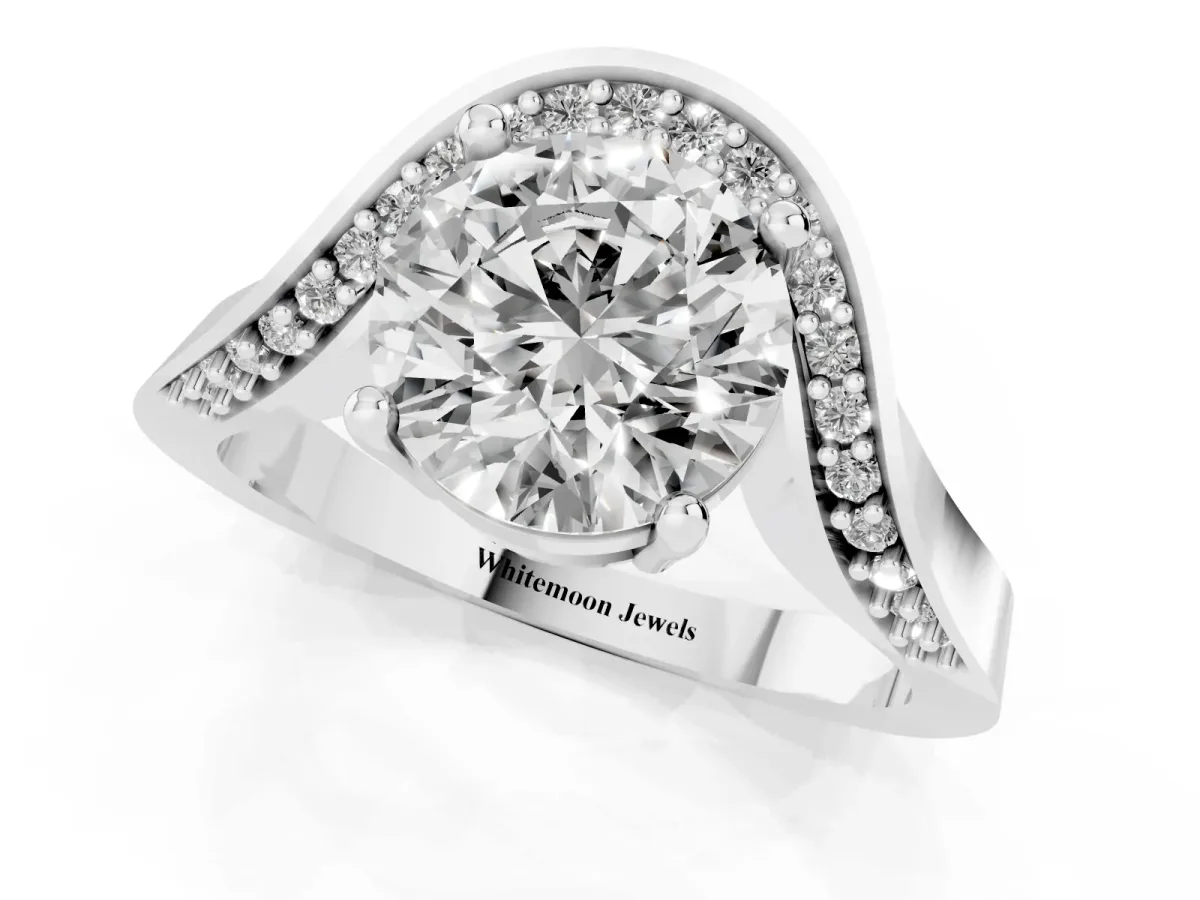 Round Cut Solitaire Diamond Engagement Ring with Pave Band and Four-Prong Setting Silver