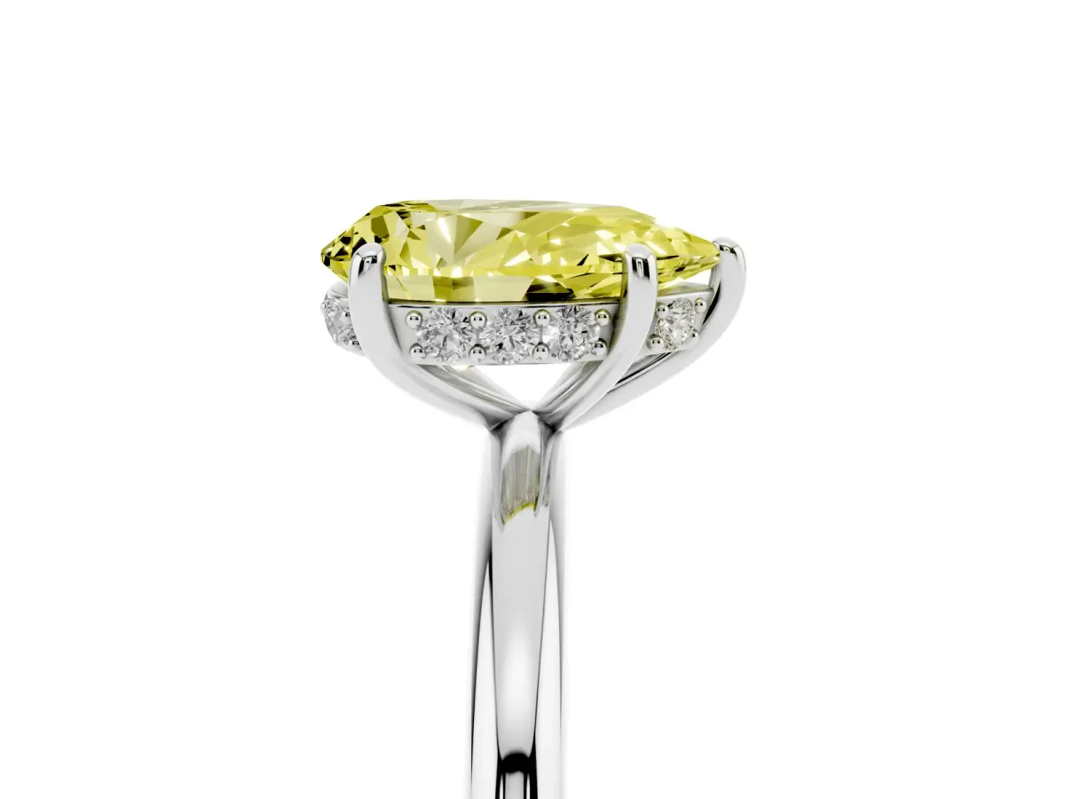 Fancy Yellow Pear Cut Solitaire Diamond Ring with a Classic Band and Four-Prong Setting Silver