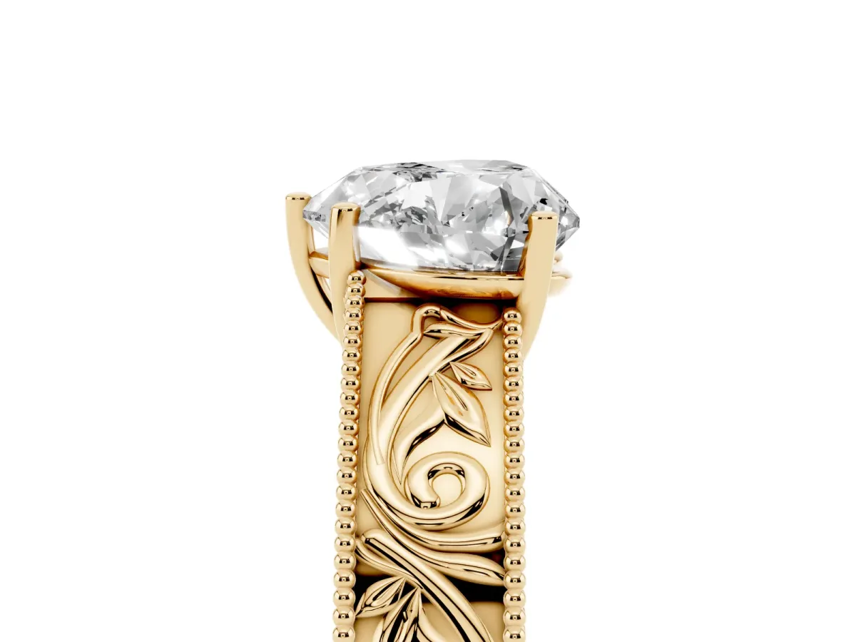 Heart Cut Diamond Solitaire Ring with Engraved Band and Four-Prong Setting Yellow gold