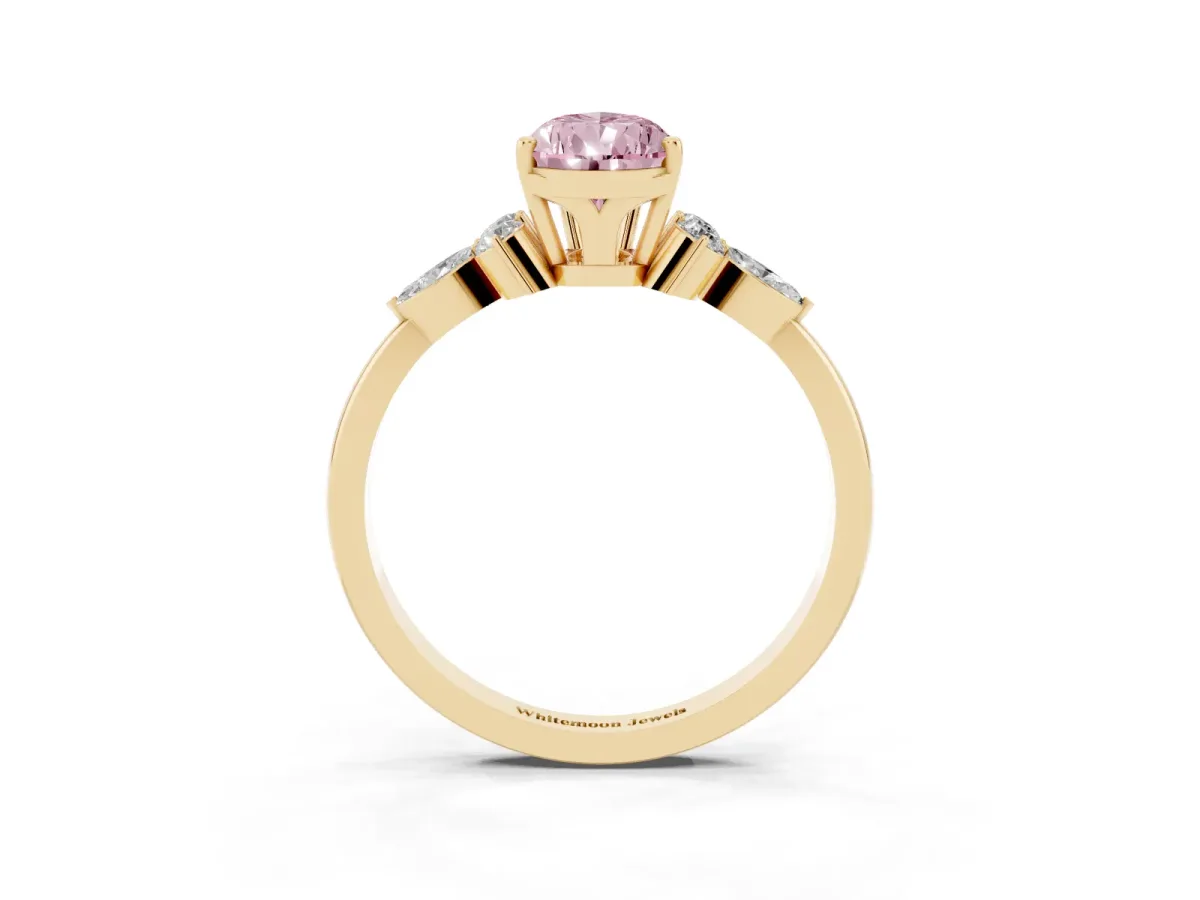 Fancy Pink Pear Cut Brilliant Diamond Solitaire Ring with Pear Side Stones and Four-Prong Setting Yellow gold