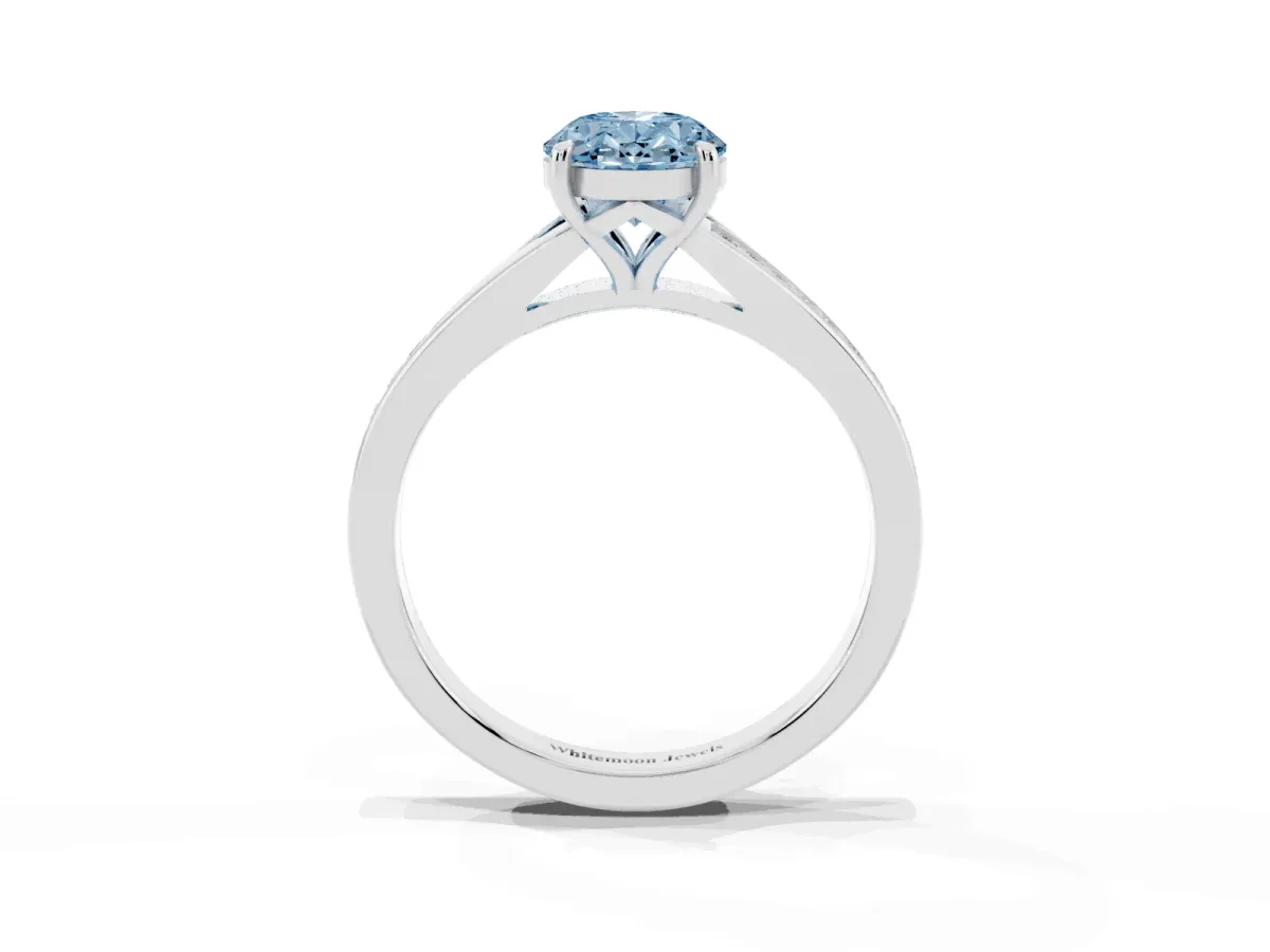 Fancy Blue Oval Cut Diamond Solitaire Ring with Pavé Band and Prong Setting Silver